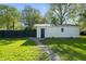 Detached garage with side yard and landscaping at 1903 Danbury Dr, Indianapolis, IN 46231