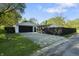 Detached garage with driveway, and backyard space at 1903 Danbury Dr, Indianapolis, IN 46231