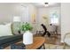 Open living room with bright windows and hardwood flooring at 1903 Danbury Dr, Indianapolis, IN 46231