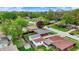 Tranquil residential area from above showing well-maintained homes and lush greenery in a close-knit neighborhood at 1964 Mann Dr, Beech Grove, IN 46107