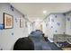 A rec room with dog-themed decor, carpet, and ample space at 1964 Mann Dr, Beech Grove, IN 46107