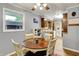 Comfortable dining area with wood table, chairs, and direct access to the kitchen at 1964 Mann Dr, Beech Grove, IN 46107
