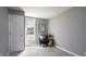 Bedroom with a window, neutral walls and carpet, and a side chair with gold table at 201 N 5Th St, Elwood, IN 46036