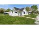 Charming single-Gathering home featuring a well-manicured lawn and classic architectural details at 201 N 5Th St, Elwood, IN 46036
