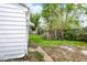 Backyard features green grass and a partial dirt area at 2015 S Hackley St, Muncie, IN 47302