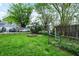 Spacious backyard with green grass and a fire pit at 2015 S Hackley St, Muncie, IN 47302