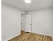 Bedroom featuring two entry doors and wood-look flooring at 2015 S Hackley St, Muncie, IN 47302