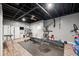 Finished basement workout area with gym equipment and painted ceiling at 2015 Saint Andrews Ct, Franklin, IN 46131