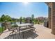 The deck overlooks a serene pond, offering a relaxing space with outdoor dining and a grill at 2015 Saint Andrews Ct, Franklin, IN 46131