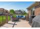 Relaxing deck area with comfortable seating and peaceful views of the landscaped backyard at 2015 Saint Andrews Ct, Franklin, IN 46131