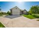Attractive single-Gathering home with lush landscaping, a spacious driveway, and a two-car garage at 2015 Saint Andrews Ct, Franklin, IN 46131