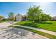 Beautiful home with manicured lawn, mature tree, and inviting curb appeal at 2015 Saint Andrews Ct, Franklin, IN 46131