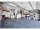 Spacious garage with ample storage, epoxy flooring, and plenty of room for vehicles and projects at 2015 Saint Andrews Ct, Franklin, IN 46131