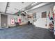Organized garage featuring epoxy flooring, ample storage, and space for vehicles and hobbies at 2015 Saint Andrews Ct, Franklin, IN 46131
