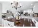 Bright kitchen boasts white cabinetry, updated countertops, and modern appliances at 2015 Saint Andrews Ct, Franklin, IN 46131
