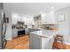 Spacious kitchen with gray cabinets, stainless steel appliances, and a granite island with barstool seating at 2015 Saint Andrews Ct, Franklin, IN 46131