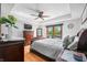 Comfortable main bedroom features a tray ceiling, dresser, and outdoor access at 2015 Saint Andrews Ct, Franklin, IN 46131