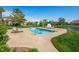 A refreshing pool has plenty of room for entertaining Gathering and friends with lounge chairs and basketball hoop at 2015 Saint Andrews Ct, Franklin, IN 46131