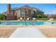 Inviting backyard pool with lounge chairs, decking, and view of the home's brick exterior at 2015 Saint Andrews Ct, Franklin, IN 46131