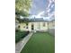 Back of house, backyard featuring artifical turf at 2119 S Garfield Dr, Indianapolis, IN 46203