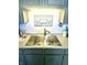 A stainless steel double sink with a modern faucet and plenty of counter space at 2119 S Garfield Dr, Indianapolis, IN 46203