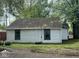 Cozy one-story home featuring classic white siding and a traditional front entrance at 2271 Park Ave, Columbus, IN 47201