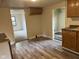 A modest kitchen with wood cabinets and laminate floors at 2271 Park Ave, Columbus, IN 47201