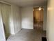 Comfortable living room featuring new flooring, neutral paint and multiple doorways at 2271 Park Ave, Columbus, IN 47201