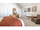 Bedroom with neutral carpet, vaulted ceilings, and wooden dressers at 2306 Alabama St, Indianapolis, IN 46205
