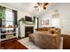 Cozy living room features a fireplace, large windows, and comfortable seating at 2306 Alabama St, Indianapolis, IN 46205
