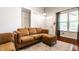 Spacious living room features a comfortable seating area, hardwood floors, and ample natural light at 2306 Alabama St, Indianapolis, IN 46205