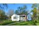 Charming single-story home with a well-maintained lawn and mature trees, offering a cozy curb appeal at 2315 E 3Rd St, Anderson, IN 46012