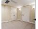 Finished basement with double closets, neutral paint, carpet flooring, and recessed lighting at 2377 Finchley Rd, Carmel, IN 46032