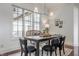 Charming dining room with a large window and stylish decor, perfect for Gathering gatherings at 2377 Finchley Rd, Carmel, IN 46032
