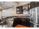 Well-equipped kitchen with granite countertops, stainless steel appliances, and modern fixtures at 2377 Finchley Rd, Carmel, IN 46032