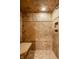 Shower with custom tile work, built in bench, and shower niche for storage at 2377 Finchley Rd, Carmel, IN 46032
