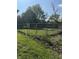 Fenced backyard with a metal chain link fence at 255 S 900 E, Zionsville, IN 46077