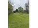 Expansive backyard with a fenced-in area, offering ample space for recreation and outdoor activities at 255 S 900 E, Zionsville, IN 46077