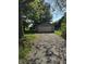Detached garage with driveway offers ample parking and storage at 255 S 900 E, Zionsville, IN 46077