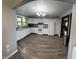 Spacious kitchen with white cabinets, sleek countertops, and modern appliances provides ample storage at 255 S 900 E, Zionsville, IN 46077