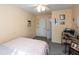 Cozy bedroom with carpet floors, neutral walls, ceiling fan, and natural light at 3131 Stillmeadow Dr, Indianapolis, IN 46214
