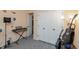 A spare bedroom is shown that has been setup as a music space at 3131 Stillmeadow Dr, Indianapolis, IN 46214
