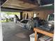 Spacious garage with various tools, equipment, and storage solutions at 318 Elva St, Anderson, IN 46013