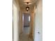 Hallway featuring overhead light fixture and view of bedroom at 318 Elva St, Anderson, IN 46013
