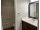 This renovated bathroom includes a large sink, updated vanity, and a mosaic-style mirror at 3720 E Southern Ave, Indianapolis, IN 46203