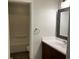 This renovated bathroom includes a large sink, updated vanity, and a mosaic-style mirror at 3720 E Southern Ave, Indianapolis, IN 46203