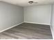 Room featuring vinyl floors and painted walls and trim at 3720 E Southern Ave, Indianapolis, IN 46203