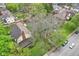 Overhead view of a tree-lined neighborhood showcasing a home's backyard and surroundings at 4169 Central Ave, Indianapolis, IN 46205