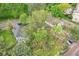 High angle aerial view of houses with mature leafy trees and a paved road at 4169 Central Ave, Indianapolis, IN 46205