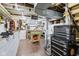 Basement workshop with tools, storage and lighting at 4169 Central Ave, Indianapolis, IN 46205